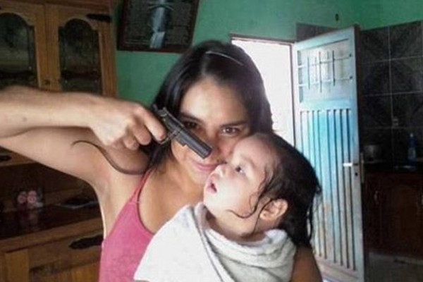 o-WOMAN-POINTING-GUN-facebook