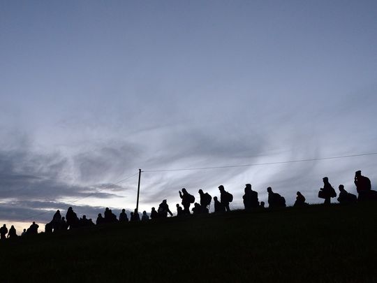 635821629524721090-AP-GERMANY-MIGRANTS-77097798