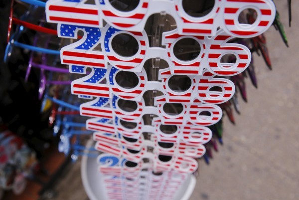 Glasses in the shape of "2016" are displayed outside of a store for revelers to wear during New Year's Eve festivities in the Times Square area of New York December 31, 2015. REUTERS/Lucas Jackson