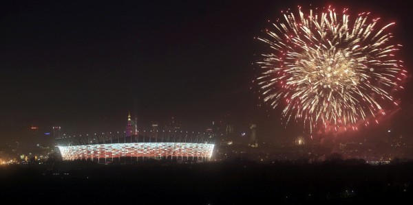 Fireworks explode next to the National stadium during New Year celebrations in Warsaw, Poland January 1, 2016. REUTERS/Jacek Marczewski/Agencja Gazeta THIS IMAGE HAS BEEN SUPPLIED BY A THIRD PARTY. IT IS DISTRIBUTED, EXACTLY AS RECEIVED BY REUTERS, AS A SERVICE TO CLIENTS. POLAND OUT. NO COMMERCIAL OR EDITORIAL SALES IN POLAND.