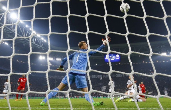 2016-02-23T215612Z_2105754016_GF10000320618_RTRMADP_3_SOCCER-CHAMPIONS-JUV-FCB