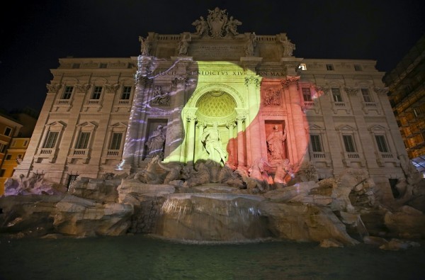 The black, yellow, and red colours of the Belgian flag are projected on the Trevi fountain in Rome, Italy, in tribute to the victims of today's Brussels bomb attacks