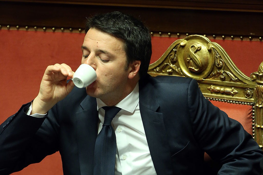 ROME, ITALY - FEBRUARY 24: Italian Prime Minister Matteo Renzi drinks an expresso coffe as he attends a debate ahead of a confidence vote for his coalition government at the Italian Senate Palazzo Madama on February 24, 2014 in Rome, Italy. Renzi, 39, is the youngest prime minister in the country's history. (Photo by Franco Origlia/Getty Images)