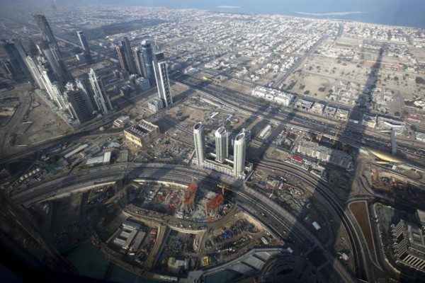 The view from the observation deck located on the 124th floor of the Burj Dubai Tower shows a shadow cast by the Tower on the city of Dubai below, January 4, 2010. REUTERS/Ahmed Jadallah