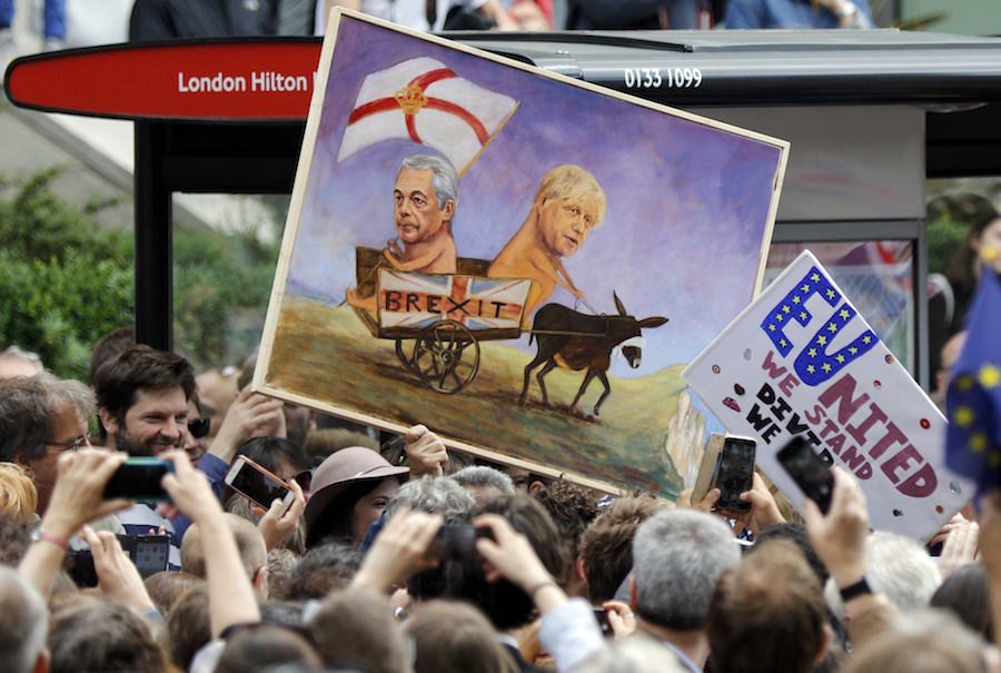 People hold banners during a 'March for Europe' demonstration against Britain's decision to leave the European Union, in central London, Britain July 2, 2016. Britain voted to leave the European Union in the EU Brexit referendum. REUTERS/Tom Jacobs