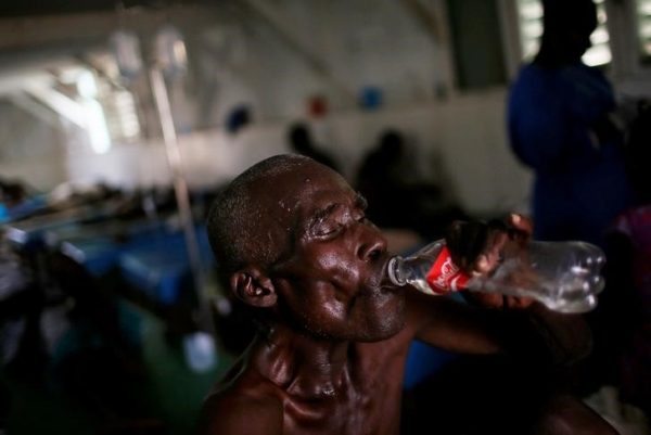 A man is treated at the cholera treatment center at the hospital after Hurricane Matthew passes in Jeremie, Haiti, October 9, 2016. REUTERS/Carlos Garcia Rawlins