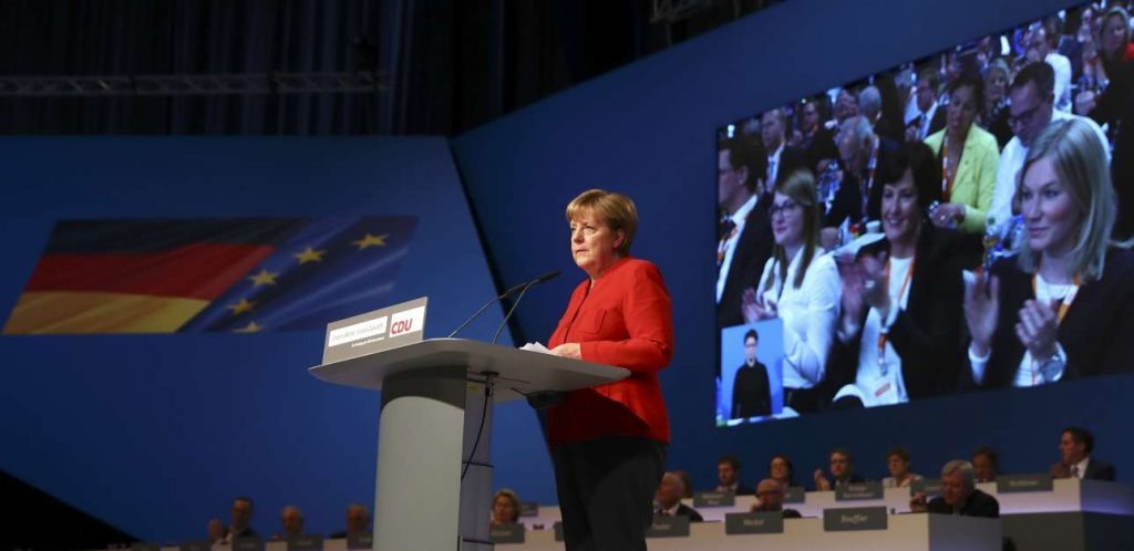 2016-12-06T111735Z_2009247445_LR1ECC60VD0FD_RTRMADP_3_GERMANY-MERKEL