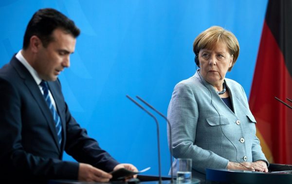 epa06550156 (L-R) Prime Minister of the former Yugoslav Republic of Macedonia Zoran Zaev and German Chancellor Angela Merkel attend a joint press conference at the Chancellery in Berlin, Germany, 21 February 2018. The first bilateral meeting between PM Zaev and German Chancellor Merkel took place on the sidelines of the EU-Western Balkans Summit in July 2017. EPA/HAYOUNG JEON