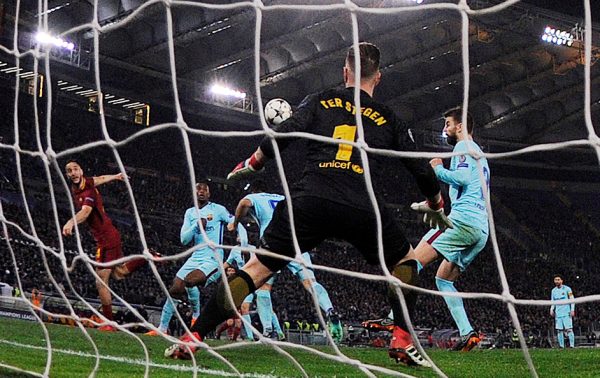 Soccer Football - Champions League Quarter Final Second Leg - AS Roma vs FC Barcelona - Stadio Olimpico, Rome, Italy - April 10, 2018 Roma's Konstantinos Manolas (L) scores their third goal past Barcelona's Marc-Andre ter Stegen REUTERS/Alberto Lingria