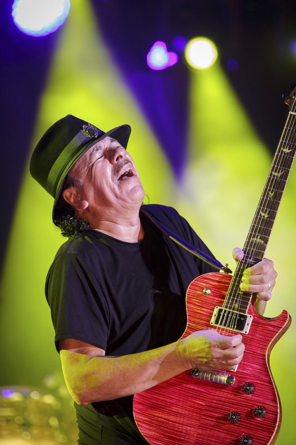 epa05438565 Mexican guitarist Carlos Santana performs during the Cap Roig Festival at the Cap Roig Gardens in Palafrugell, Girona, Spain, 23 July 2016. EPA/DAVID BORRAT