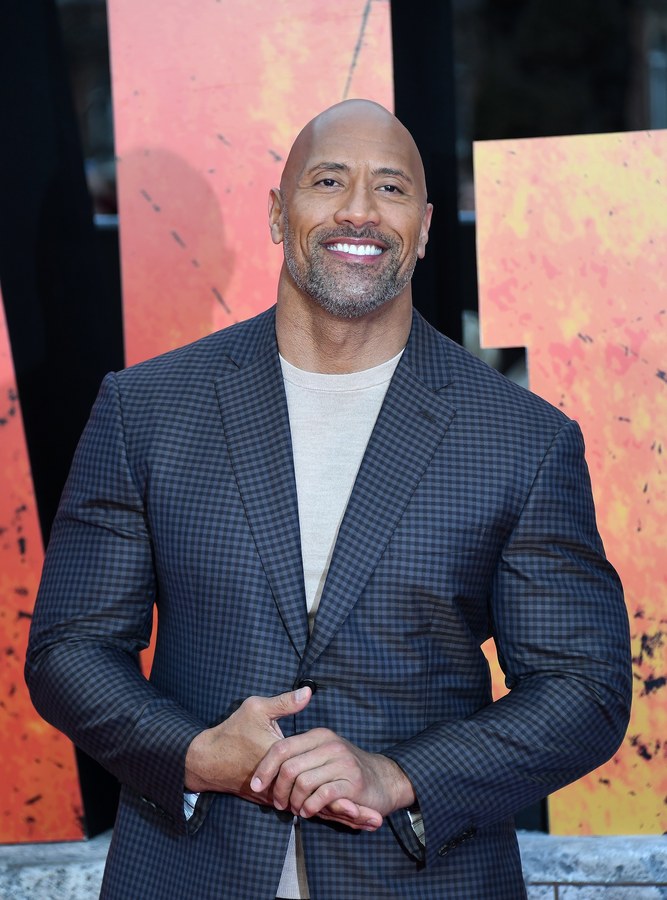 epa06662056 US actor Dwayne Johnson poses for photographs on the red carpet during the European film premiere of Rampage at Leicester Square in London, Britain, 11 April 2018. The movie opens across many European theaters on 12 April. EPA/ANDY RAIN